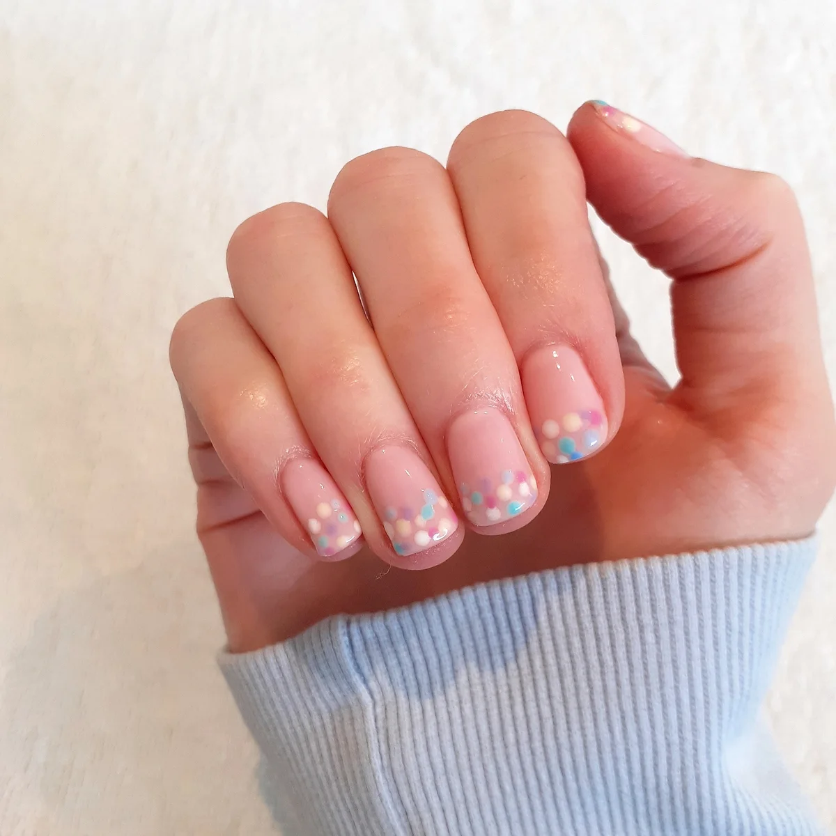Pastel dotted nail art on a finished VGBeauty manicure