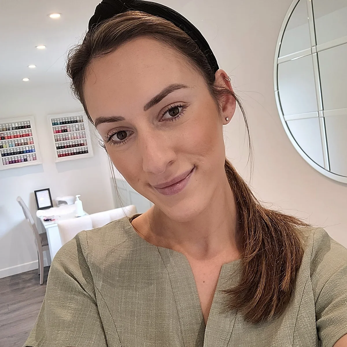 Victoria, owner of VGBeauty, in the garden salon